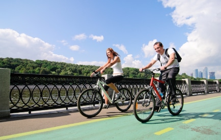 Man and woman cycling