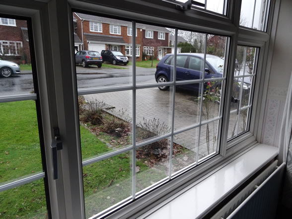 Looking out the window at rainy scene