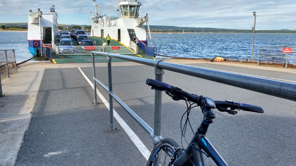 My bike on the quay with ferry approaching