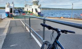 My bike on the quay with ferry approaching